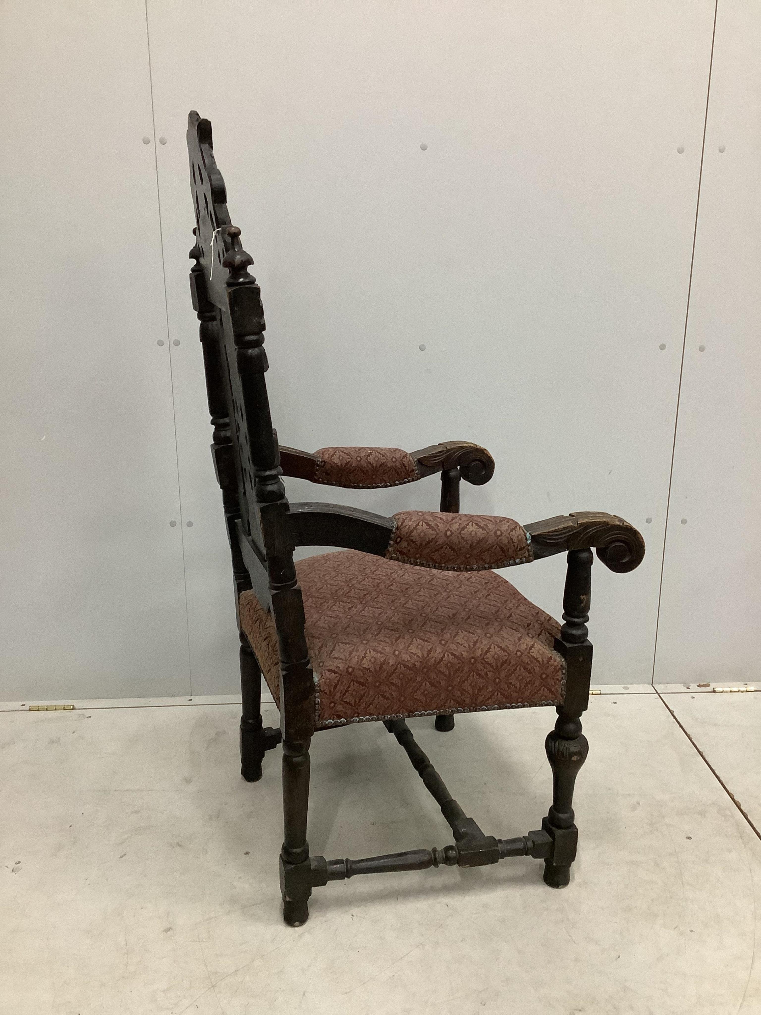 A set of thirteen carved Victorian oak dining chairs, one with arms. Condition - poor to fair